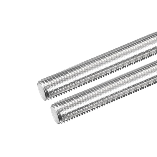 Two metal threaded rods on a white background